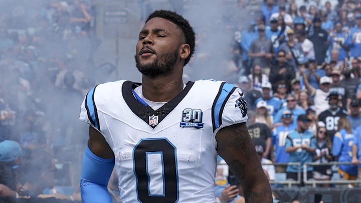 Sep 15, 2024; Charlotte, North Carolina, USA; Carolina Panthers tight end Ja'Tavion Sanders (0) takes the field against the Los Angeles Chargers during the first quarter at Bank of America Stadium. Mandatory Credit: Jim Dedmon-Imagn Images