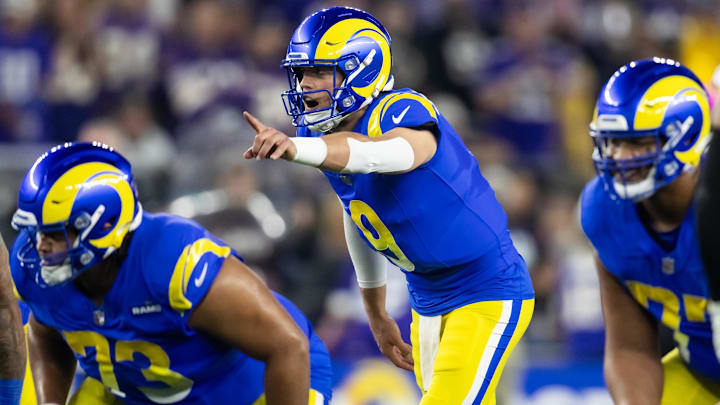 Jan 13, 2025; Glendale, AZ, USA; Los Angeles Rams quarterback Matthew Stafford (9) against the Minnesota Vikings during an NFC wild card game at State Farm Stadium. Mandatory Credit: Mark J. Rebilas-Imagn Images