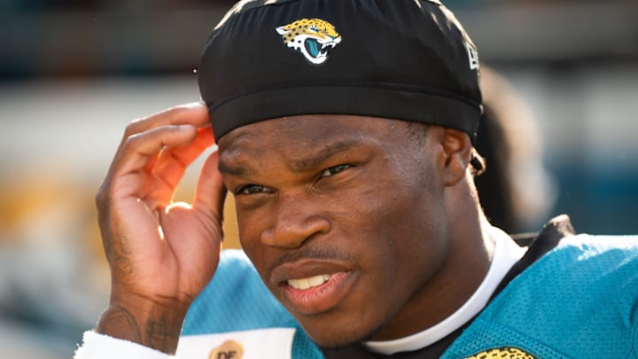 Jacksonville Jaguars wide receiver Travis Hunter (12) runs out of the tunnel during Helmet Walk before an NFL scrimmage at EverBank Stadium Friday August 1, 2025, in Jacksonville, Fla. [Doug Engle/Florida Times-Union]