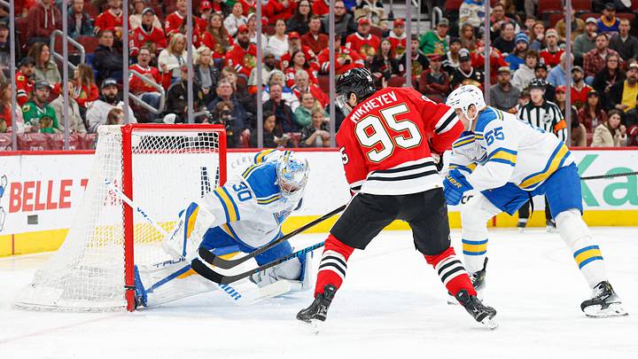 Apr 11, 2026; Chicago, Illinois, USA; St. Louis Blues goaltender Joel Hofer (30) defends against Chicago Blackhawks right wing Ilya Mikheyev (95) during the first period at United Center. Mandatory Credit: Kamil Krzaczynski-Imagn Images