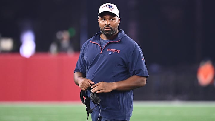 Aug 15, 2024; Foxborough, MA, USA; New England Patriots head coach Jerod Mayo walks out to check on an injured player during the second half against the Philadelphia Eagles at Gillette Stadium. Mandatory Credit: Eric Canha-Imagn Images