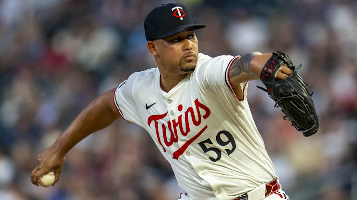 Jul 9, 2025; Minneapolis, Minnesota, USA; Minnesota Twins relief pitcher Jhoan Duran (59) delivers a pitch against the Chicago Cubs in the ninth inning at Target Field