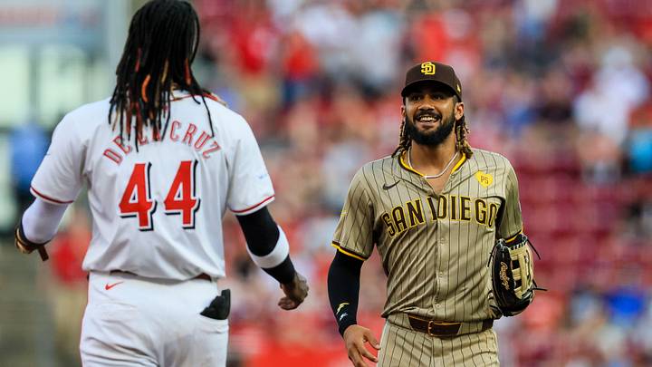 May 21, 2024; Cincinnati, Ohio, USA; San Diego Padres outfielder Fernando Tatis Jr. (23) and Cincinnati Reds shortstop Elly De La Cruz (44) during the third inning at Great American Ball Park. Mandatory Credit: Katie Stratman-USA TODAY Sports