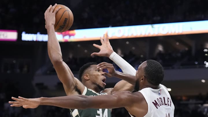 Nov 2, 2024; Milwaukee, Wisconsin, USA; Milwaukee Bucks forward Giannis Antetokounmpo (34) drives to the basket against Cleveland Cavaliers forward Evan Mobley (4) in the final minutes of the game at Fiserv Forum. Mandatory Credit: Michael McLoone-Imagn Images Nov 2, 2024; Milwaukee, Wisconsin, USA; Milwaukee Bucks forward Giannis Antetokounmpo (34) drives to the basket against Cleveland Cavaliers forward Evan Mobley (4) in the final minutes of the game at Fiserv Forum. Mandatory Credit: Michael McLoone-Imagn Images
