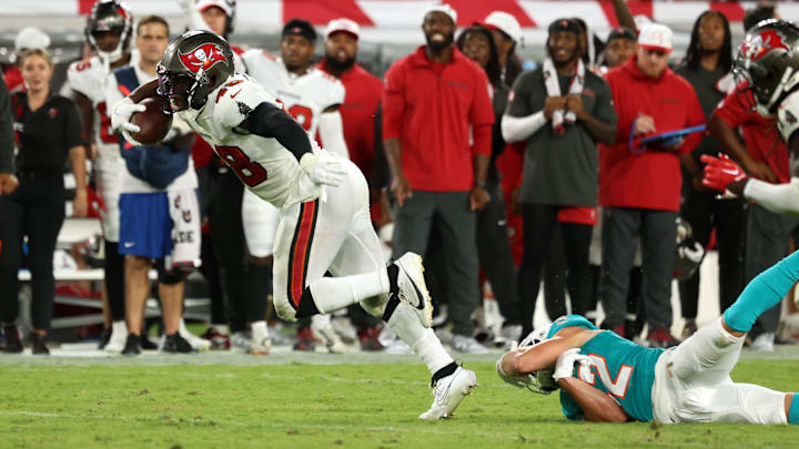 Aug 23, 2024; Tampa, Florida, USA;  Tampa Bay Buccaneers linebacker Antonio Grier Jr. (48) intercepted   the ball against the Miami Dolphins during the second half at Raymond James Stadium. Mandatory Credit: Kim Klement Neitzel-Imagn Images