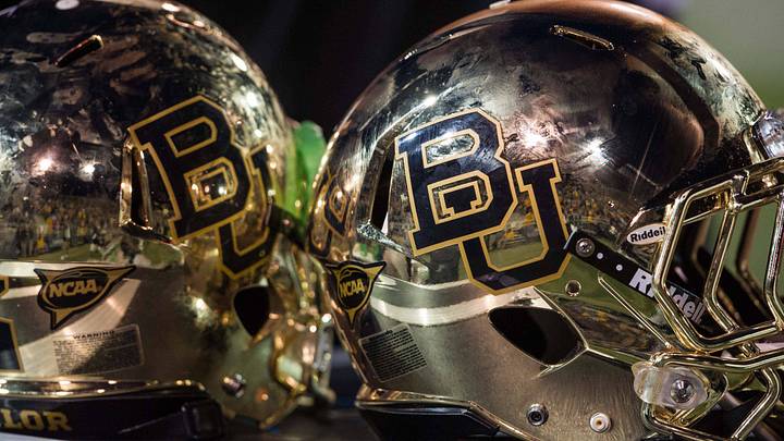 Oct 5, 2013; Waco, TX, USA; A view of the new chrome Baylor Bears helmets during the game between the Bears and the West Virginia Mountaineers at Floyd Casey Stadium. The Bears defeated the Mountaineers 73-42. Mandatory Credit: Jerome Miron-USA TODAY Sports Oct 5, 2013; Waco, TX, USA; A view of the new chrome Baylor Bears helmets during the game between the Bears and the West Virginia Mountaineers at Floyd Casey Stadium. The Bears defeated the Mountaineers 73-42. Mandatory Credit: Jerome Miron-USA TODAY Sports