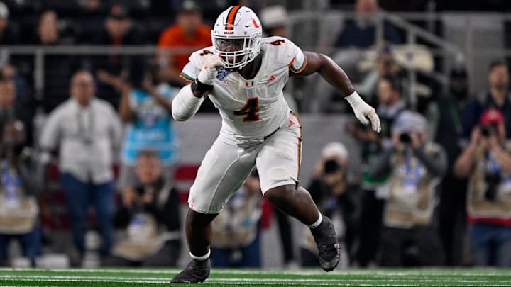 Dec 31, 2025; Arlington, TX, USA; Miami Hurricanes defensive lineman Rueben Bain Jr. (4) rushes the line during the 2025 Cotton Bowl and quarterfinal game of the College Football Playoff at AT&T Stadium. Mandatory Credit: Jerome Miron-Imagn Images