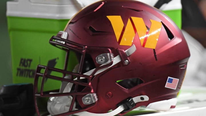 Washington Commanders helmet sits on the sidelines against the Philadelphia Eagles. Washington Commanders helmet sits on the sidelines against the Philadelphia Eagles.