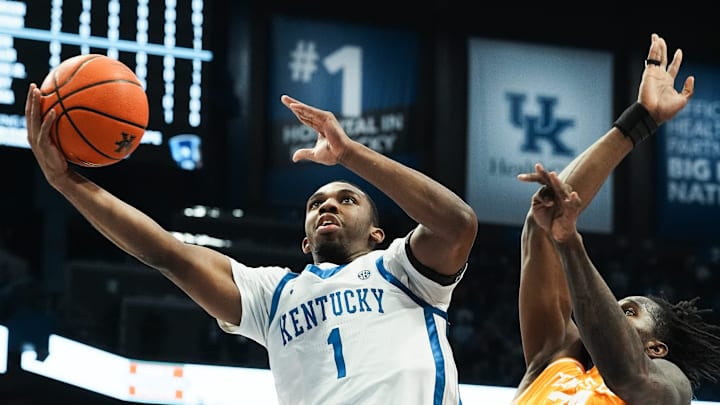 Kentucky's Lamont Butler (1) scores against Tennessee's Felix Okpara (34) during their game at Rupp Arena in Lexington, Ky. on Feb. 11, 2025.
