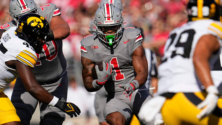 Oct 5, 2024; Columbus, OH, USA; Ohio State Buckeyes running back Quinshon Judkins (1) runs up the middle during the first half of the NCAA football game against the Iowa Hawkeyes at Ohio Stadium.
