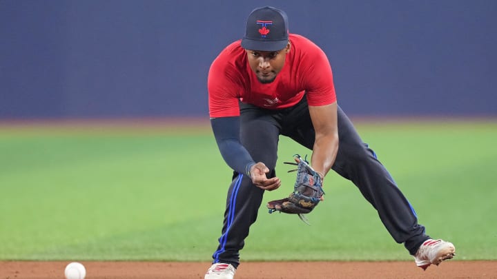 Jun 19, 2024; Toronto, Ontario, CAN; Toronto Blue Jays shortstop Orelvis Martinez (13) fields balls during batting practice before game against the Boston Red Sox at Rogers Centre. Mandatory Credit: Nick Turchiaro-USA TODAY Sports