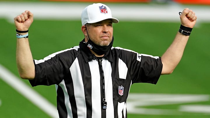 Nov 8, 2020; Inglewood, California, USA; NFL referee Brad Rogers makes a call during the first half at SoFi Stadium during a game between the Las Vegas Raiders and the Los Angeles Chargers.  