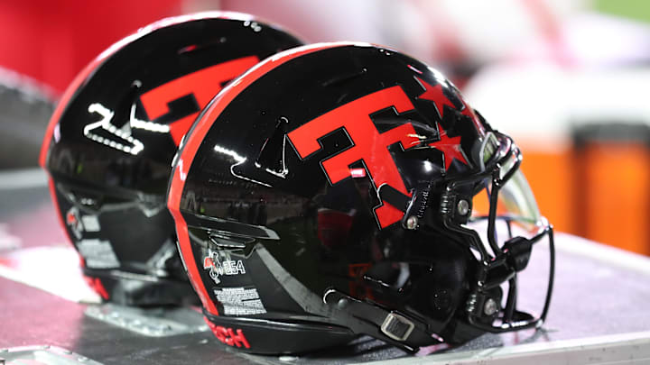 A general view of Texas Tech Red Raiders helmets in the second half on the bench during the game against the Kansas Jayhawks at Jones AT&T Stadium.