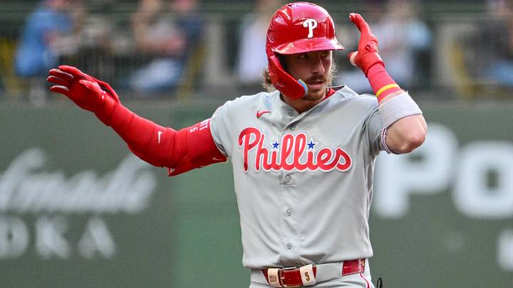 Jun 13, 2026; Milwaukee, Wisconsin, USA;  Philadelphia Phillies second baseman Bryson Stott (5) reacts after hittng a double to drive in a run in the fourth inning against the Milwaukee Brewers at American Family Field.