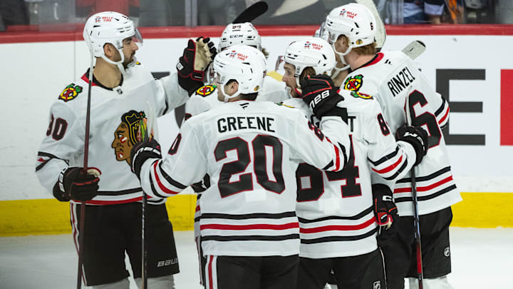 Apr 15, 2025; Ottawa, Ontario, CAN; The Chicago Blackhawks celebrate a goal scored by center Frank Nazar (91) in overtime against the Ottawa Senators at the Canadian Tire Centre. Mandatory Credit: Marc DesRosiers-Imagn Images
