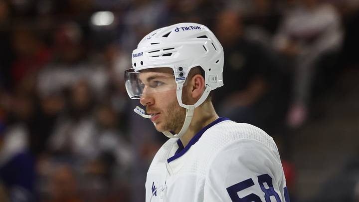 Dec 29, 2022; Tempe, Arizona, USA; Toronto Maple Leafs left wing Michael Bunting (58) against the Arizona Coyotes at Mullett Arena. Mandatory Credit: Mark J. Rebilas-USA TODAY Sports