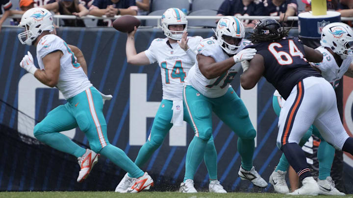 Miami Dolphins quarterback Quinn Ewers (14) passes the ball against the Chicago Bears during the second half at Soldier Field.