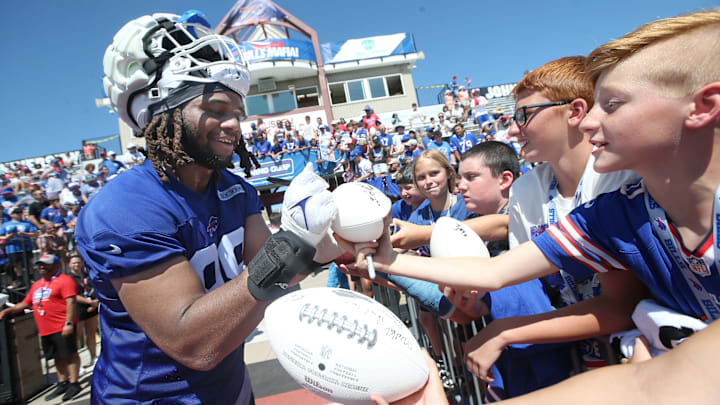 Bills rookie T.J. Sanders signs autographs for fans during the opening day of Buffalo Bills training camp at St. John Fisher University.