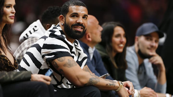 Jan 14, 2022; Miami, Florida, USA; Canadian rapper Drake attends the game between the Miami Heat and the Atlanta Hawks at FTX Arena. Mandatory Credit: Sam Navarro-Imagn Images