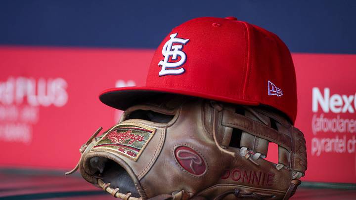 Apr 21, 2025; Atlanta, Georgia, USA; A St. Louis Cardinals hat and glove in the dugout against the Atlanta Braves in the first inning at Truist Park. Mandatory Credit: Brett Davis-Imagn Images Apr 21, 2025; Atlanta, Georgia, USA; A St. Louis Cardinals hat and glove in the dugout against the Atlanta Braves in the first inning at Truist Park. Mandatory Credit: Brett Davis-Imagn Images