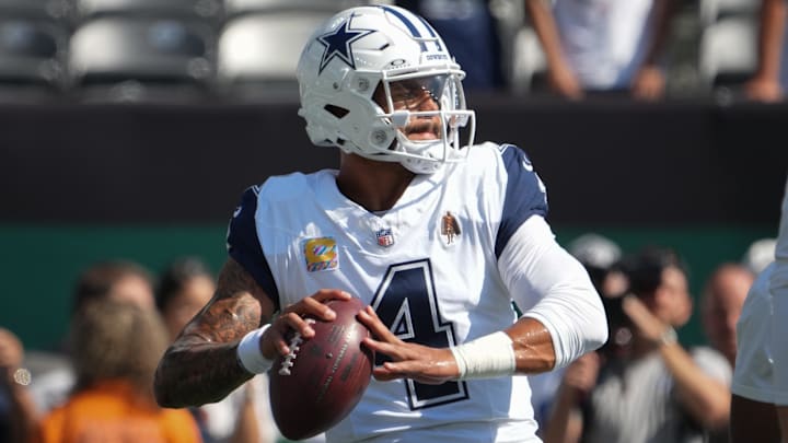 Oct 5, 2025; East Rutherford, New Jersey, USA;  Dallas Cowboys quarterback Dak Prescott (4) warm ups prior to a game against the New York Jets at MetLife Stadium. Mandatory Credit: Robert Deutsch-Imagn Images