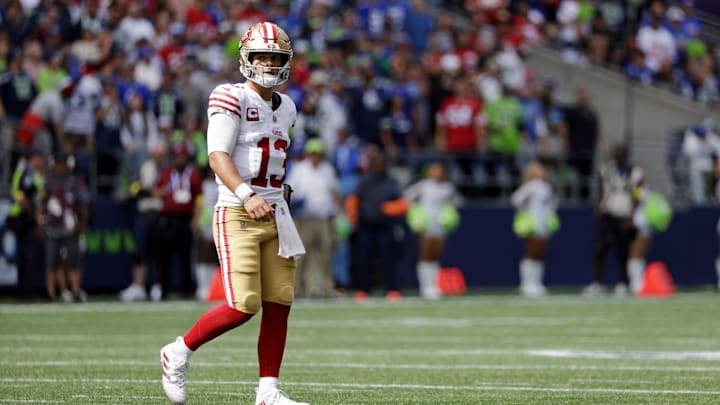 Sep 7, 2025; Seattle, Washington, USA; San Francisco 49ers quarterback Brock Purdy (13) looks on during the first half against the Seattle Seahawks at Lumen Field. Mandatory Credit: Joe Nicholson-Imagn Images