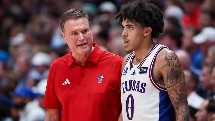 Oct 25, 2026; Lawrence, Kansas, USA; Kansas Jayhawks head coach Bill Self talks to Kansas Jayhawks guard Taylen Kinney (0) during a game against the Duke Blue Devils at Allen Fieldhouse. Mandatory Credit: Scott Sewell-Imagn Images Oct 25, 2026; Lawrence, Kansas, USA; Kansas Jayhawks head coach Bill Self talks to Kansas Jayhawks guard Taylen Kinney (0) during a game against the Duke Blue Devils at Allen Fieldhouse. Mandatory Credit: Scott Sewell-Imagn Images