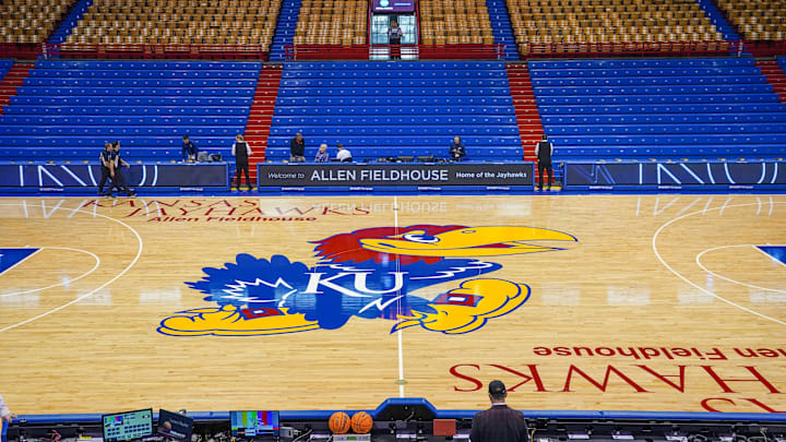 Dec 31, 2022; Lawrence, Kansas, USA; A general view of the center court logo prior to a game between the Kansas Jayhawks and Oklahoma State Cowboys at Allen Fieldhouse. Mandatory Credit: Denny Medley-Imagn Images Dec 31, 2022; Lawrence, Kansas, USA; A general view of the center court logo prior to a game between the Kansas Jayhawks and Oklahoma State Cowboys at Allen Fieldhouse. Mandatory Credit: Denny Medley-Imagn Images