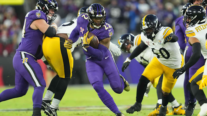 Dec 21, 2024; Baltimore, Maryland, USA; Baltimore Ravens running back Derrick Henry (22) runs for a gain against the Pittsburgh Steelers in the first quarter at M&T Bank Stadium. Mandatory Credit: Mitch Stringer-Imagn Images Dec 21, 2024; Baltimore, Maryland, USA; Baltimore Ravens running back Derrick Henry (22) runs for a gain against the Pittsburgh Steelers in the first quarter at M&T Bank Stadium. Mandatory Credit: Mitch Stringer-Imagn Images