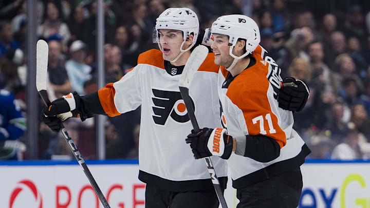 Dec 28, 2023; Vancouver, British Columbia, CAN; Philadelphia Flyers defenseman Egor Zamula (5) and