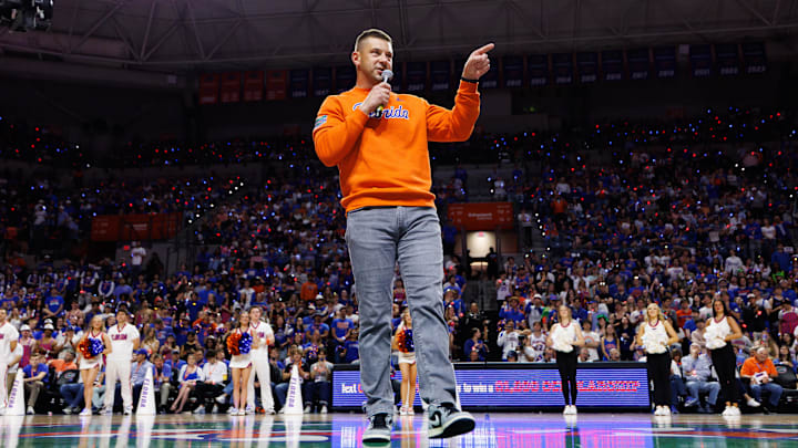 Jan 24, 2026; Gainesville, Florida, USA; Florida Gators Football head coach Jon Sumrall addresses the crowd during a timeout against the Auburn Tigers during the first half at Exactech Arena at the Stephen C. O'Connell Center. Mandatory Credit: Matt Pendleton-Imagn Images