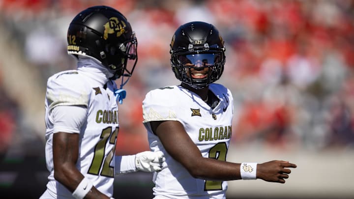 Oct 19, 2024; Tucson, Arizona, USA; Colorado Buffalos quarterback Shedeur Sanders (2) with wide receiver Travis Hunter (12) against the Arizona Wildcats at Arizona Stadium. Mandatory Credit: Mark J. Rebilas-Imagn Images Oct 19, 2024; Tucson, Arizona, USA; Colorado Buffalos quarterback Shedeur Sanders (2) with wide receiver Travis Hunter (12) against the Arizona Wildcats at Arizona Stadium. Mandatory Credit: Mark J. Rebilas-Imagn Images