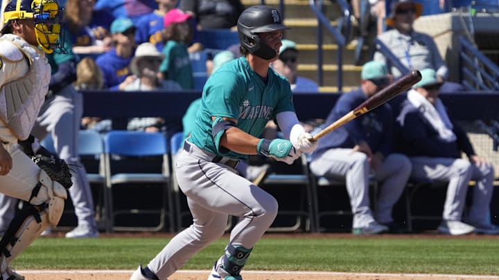 Seattle Mariners second baseman Cole Young hits during a spring training game against the Milwaukee Brewers on March 9 at American Family Fields.