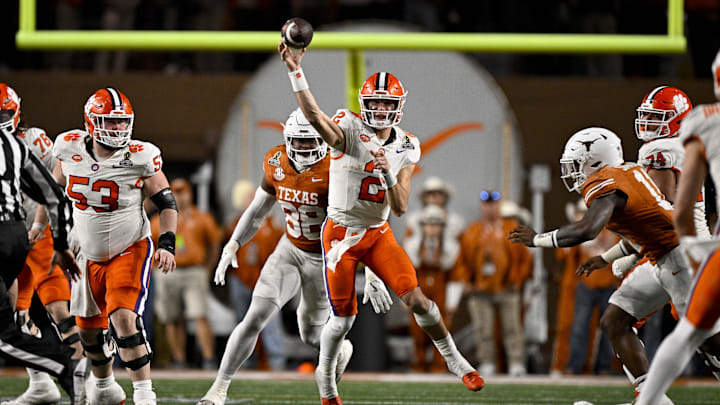Dec 21, 2024; Austin, Texas, USA; Clemson Tigers quarterback Cade Klubnik (2) passes the ball for a first down against the Texas Longhorns during the second half of the CFP National Playoff first round game at Darrell K Royal-Texas Memorial Stadium. Dec 21, 2024; Austin, Texas, USA; Clemson Tigers quarterback Cade Klubnik (2) passes the ball for a first down against the Texas Longhorns during the second half of the CFP National Playoff first round game at Darrell K Royal-Texas Memorial Stadium.