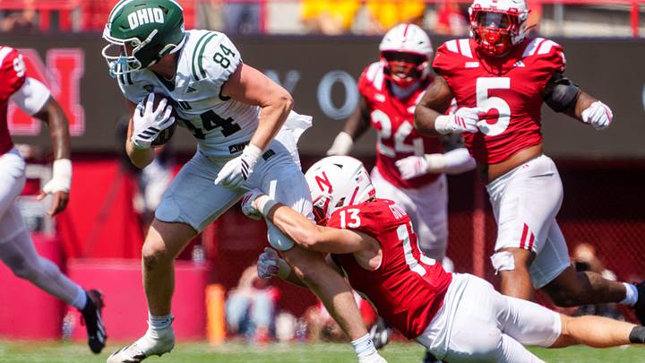 Nebraska safety Rex Guthrie tackles Ohio tight end AJ Miller during the fourth quarter. Nebraska safety Rex Guthrie tackles Ohio tight end AJ Miller during the fourth quarter.