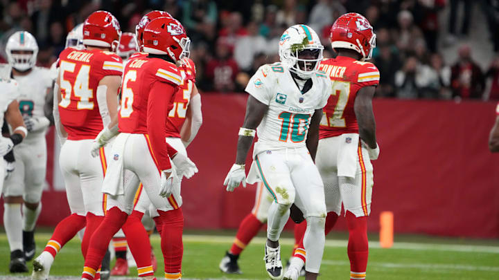 Nov 5, 2023; Frankfurt, Germany; Miami Dolphins wide receiver Tyreek Hill (10) celebrates after a reception against the Kansas City Chiefs during an NFL International Series game at Deutsche Bank Park. Mandatory Credit: Kirby Lee-Imagn Images