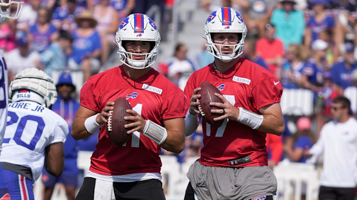 Buffalo Bills quarterback Mitchell Trubisky and quarterback Josh Allen drop back in synch as they prepare to throw a pass at St. John Fisher University in Pittsford on July 24, 2025.