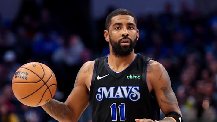 Dec 1, 2023; Dallas, Texas, USA;  Dallas Mavericks guard Kyrie Irving (11) dribbles during the