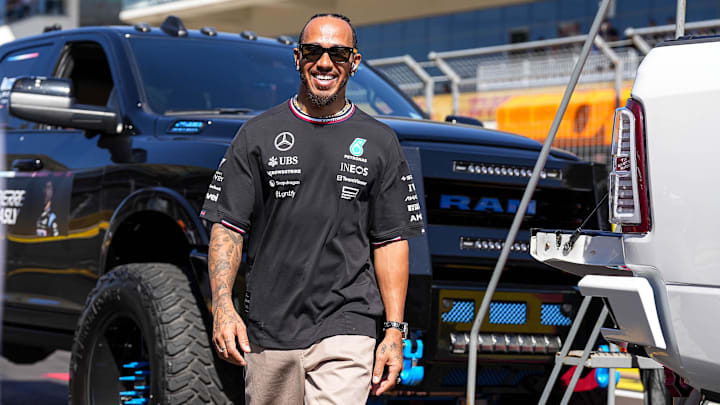 Oct 20, 2024; Austin, Texas, USA; Mercedes-AMG Petronas driver Lewis Hamilton walks the track ahead of the drivers' parade at the Formula 1 Pirelli United States Grand Prix at Circuit of the Americas. Mandatory Credit: Aaron E. Martinez-Imagn Images