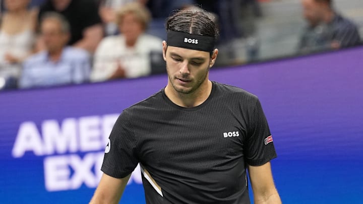 Sep 2, 2025; Flushing, NY, USA; Taylor Fritz (USA) after a missed shot to Novak Djokovic (SRB) (not pictured) on day ten of the 2025 U.S. Open tennis tournament at the USTA Billie Jean King National Tennis Center.