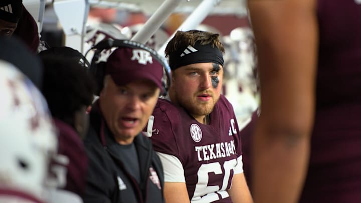 Sep 28, 2024; Arlington, Texas, USA; Texas A&M Aggies offensive lineman Trey Zuhn III (60) sits on the bench during the Southwest Classic against the Arkansas Razorbacks at AT&T Stadium.