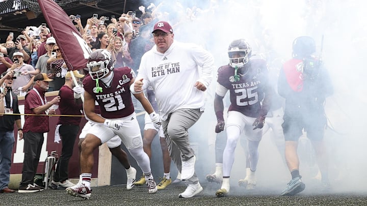 Texas A&M Aggies head coach Mike Elko takes the field prior to the game against the Miami Hurricanes during the first round of the CFP