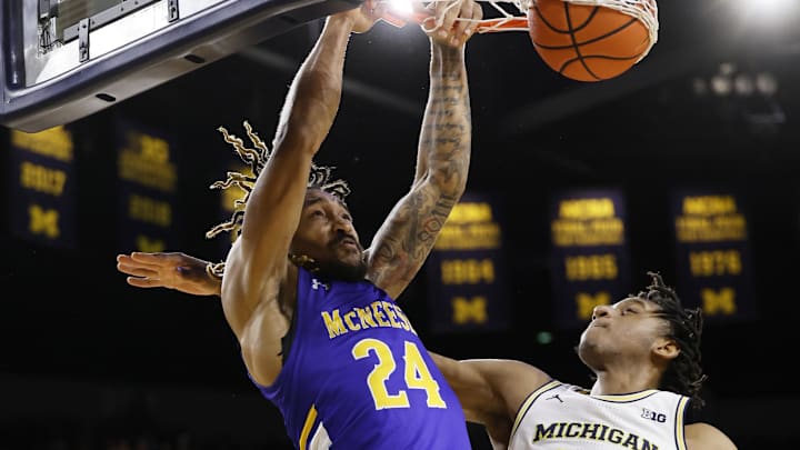 Dec 29, 2023; Ann Arbor, Michigan, USA;  McNeese State Cowboys forward Christian Shumate (24) dunks against Michigan. 