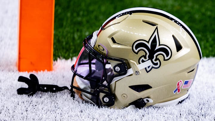Sep 8, 2024; New Orleans, Louisiana, USA;  Detailed view of the New Orleans Saints football helmet before the game against the Carolina Panthers during the pregame at Caesars Superdome. Mandatory Credit: Stephen Lew-Imagn Images