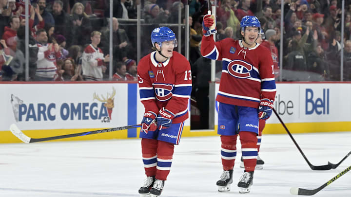 Jan 6, 2025; Montreal, Quebec, CAN; Montreal Canadiens forward Cole Caufield (13) celebrates the win against the Vancouver Canucks with teammate forward Alex Newhook (15) at the Bell Centre. Mandatory Credit: Eric Bolte-Imagn Images Jan 6, 2025; Montreal, Quebec, CAN; Montreal Canadiens forward Cole Caufield (13) celebrates the win against the Vancouver Canucks with teammate forward Alex Newhook (15) at the Bell Centre. Mandatory Credit: Eric Bolte-Imagn Images