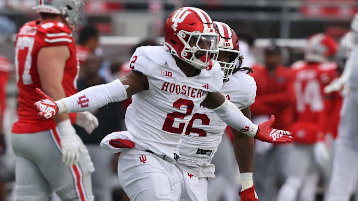 Indiana Hoosiers linebacker Jailin Walker (2) celebrates his interception during the second quarter against the Ohio State Buckeyes at Ohio Stadium. Indiana Hoosiers linebacker Jailin Walker (2) celebrates his interception during the second quarter against the Ohio State Buckeyes at Ohio Stadium.