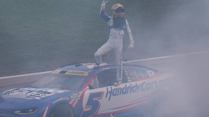 Kyle Larson celebrates following a dominant win in the NASCAR Cup Series Hollywood Casino 400 at Kansas Speedway. Kyle Larson celebrates following a dominant win in the NASCAR Cup Series Hollywood Casino 400 at Kansas Speedway.