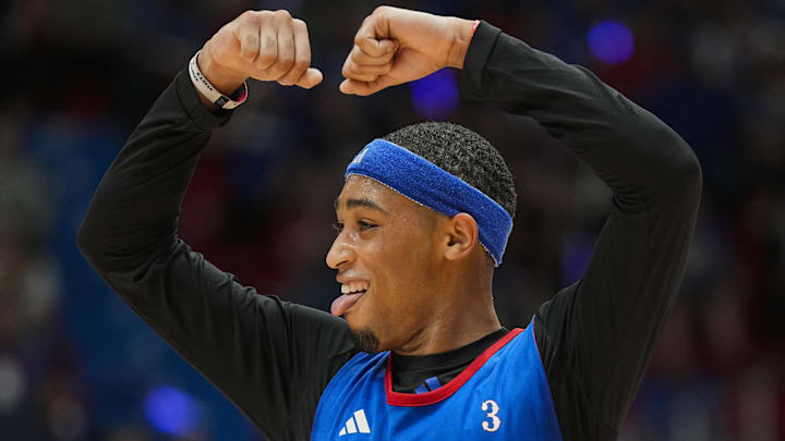 Oct 18, 2024; Lawrence, KS, USA; Kansas Jayhawks guard Dajuan Harris Jr. (3) celebrates after a scrimmage during Late Night in the Phog at Allen Fieldhouse. Mandatory Credit: Jay Biggerstaff-Imagn Images Oct 18, 2024; Lawrence, KS, USA; Kansas Jayhawks guard Dajuan Harris Jr. (3) celebrates after a scrimmage during Late Night in the Phog at Allen Fieldhouse. Mandatory Credit: Jay Biggerstaff-Imagn Images