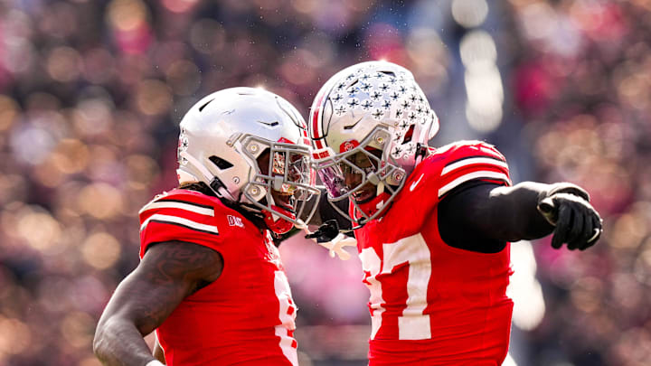 Ohio State Buckeyes linebacker Arvell Reese (8) and defensive end Kenyatta Jackson Jr. (97) celebrate in the second half of the college football game at Ohio Stadium on Saturday, Nov. 1, 2025 in Columbus, Ohio.
