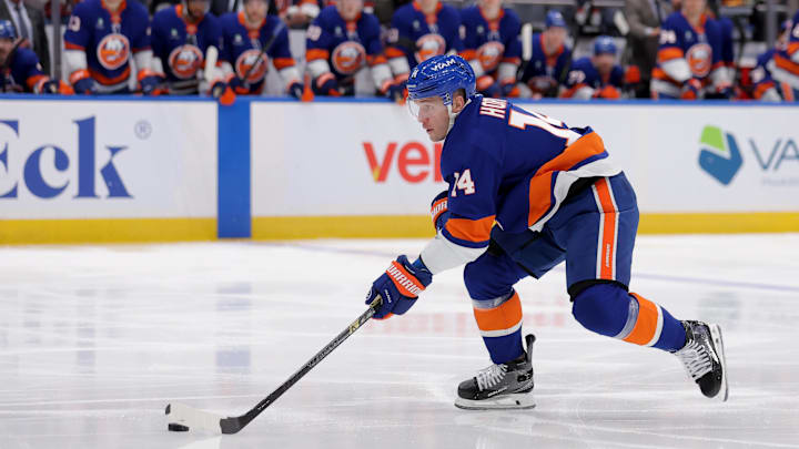 Jan 24, 2026; Elmont, New York, USA; New York Islanders center Bo Horvat (14) skates with the puck against the Buffalo Sabres during the second period at UBS Arena. Mandatory Credit: Brad Penner-Imagn Images